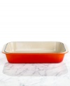 Roast and  boast. It's all in good taste when you roast your meat or prepare a lasagna in this enameled ceramic pan. The wide, shallow shape exposes a maximum area of food to the heat source, whether it be all around heat in the oven, under the broiler or on the stovetop for frying. Limited lifetime warranty.