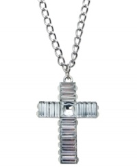 A symbol of faith. This pendant necklace from GUESS shines with crystal baguettes on a cross silhouette. Crafted in silver tone mixed metal. Approximate length: 32 inches + 2-inch extender. Approximate drop: 2 inches. A symbol of faith. This pendant necklace from GUESS shines with crystal baguettes on a cross silhouette. Crafted in silver tone mixed metal. Approximate length: 32 inches + 2-inch extender. Approximate drop: 2 inches.
