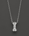 From the Tiny Treasures collection, a diamond I necklace. With signature ruby accent. Designed by Roberto Coin.