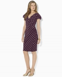 Delicate shirring and exquisite tiered flutter sleeves give a body-conscious matte jersey dress an elegant, ultra-feminine look from Lauren by Ralph Lauren. Delicate shirring and exquisite tiered flutter sleeves give a body-conscious matte jersey dress an elegant, ultra-feminine look from Lauren by Ralph Lauren.