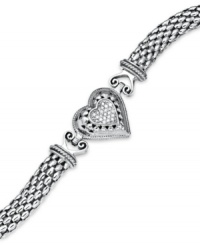 A romantic accent. This chic, heart charm bracelet is outlined by sparkling round-cut diamonds (1/6 ct. t.w.) with a trendy mesh chain. Set in sterling silver. Approximate length: 7-1/2 inches.