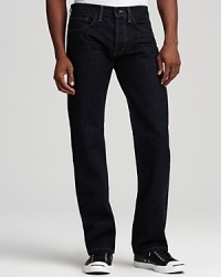 Hoyle Jackson's dark washed denim sports a slim cut for modern appeal.