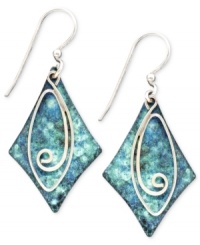 Sky blue earrings with an earthy feel. These organic-inspired earrings by Jody Coyote feature a blue patina brass diamond with a swirling silver accent and bead charms. Earrings crafted in sterling silver. Approximate drop: 1-5/8 inches. Sky blue earrings with an earthy feel. These organic-inspired earrings by Jody Coyote feature a blue patina brass diamond with a swirling silver accent and bead charms. Earrings crafted in sterling silver. Approximate drop: 1-5/8 inches.