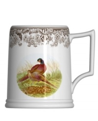 Enjoy the outdoors more. Illustrated with pheasant and Spode's 1828 British flowers border, the Woodland tankard beer mug offers a brand new way to toast and take in the scenery. Birds appear on both sides of mug. Enjoy the outdoors more. Illustrated with pheasant and Spode's 1828 British flowers border, the Woodland tankard beer mug offers a brand new way to toast and take in the scenery. Birds appear on both sides of mug.