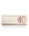 For the theater or opera or out to dance, you'll have impeccable elegance in the palm of your hand. Jessica McClintock's satin long evening clutch with rosette accompanies many an evening ensemble.