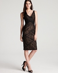 In asymmetric paneled lace, this ML Monique Lhuillier dress lends timeless glamour. In asymmetric paneled lace, this ML Monique Lhuillier dress lends timeless glamour.