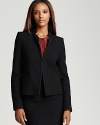 Command the corner office in a Bloomingdale's exclusive Gerard Darel blazer, touting sharp tailoring and clean lines for a strong silhouette.