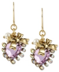 Crush-worthy earrings from Betsey Johnson. Featuring a pink-colored crystal heart outlined with small round-cut crystal accents, gold tone bow and small glass pearl. Crafted in antiqued gold tone mixed metal. Approximate drop: 1-1/2 inches. Crush-worthy earrings from Betsey Johnson. Featuring a pink-colored crystal heart outlined with small round-cut crystal accents, gold tone bow and small glass pearl. Crafted in antiqued gold tone mixed metal. Approximate drop: 1-1/2 inches.