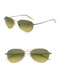 A revised look for the classic aviator style, designed with double-bridge detail and metal frames. Available in gold frames with gradient peridot lenses. 100% UV protective Imported A revised look for the classic aviator style, designed with double-bridge detail and metal frames. Available in gold frames with gradient peridot lenses. 100% UV protective Imported