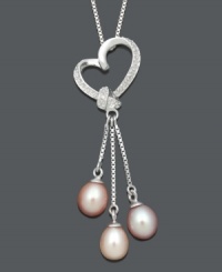 Pretty enough for a princess. This cut-out heart pendant features a delightful asymmetrical design dusted with diamond accents. Pale pastel cultured freshwater pearls (6-7 mm) hang from three delicate chains. Approximate length: 18 inches Approximate drop: 2 inches.