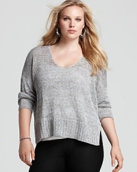 This Eileen Fisher boxy sweater takes a classic relaxed silhouette and updates it in a marled linen knit with thick ribbing at the hem. This Eileen Fisher boxy sweater takes a classic relaxed silhouette and updates it in a marled linen knit with thick ribbing at the hem.