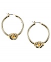 Tie your look together. These classy hoop earrings from AK Anne Klein add a twist with chic knot detail. Crafted in gold tone mixed metal. Approximate diameter: 1 inches.