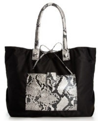 Set summer on fire with this Brasil-inspired tote from FALCHI by Falchi. Sleek snakeskin accents and a femme bow closure add polished touches to this wild design. Set summer on fire with this Brasil-inspired tote from FALCHI by Falchi. Sleek snakeskin accents and a femme bow closure add polished touches to this wild design.