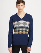 Nordic diamonds and Fair Isle borders are smartly printed at chest level all around this striking pure wool design.Ribbed V necklineLong sleeves with ribbed cuffsRibbed hemWoolHand washImported