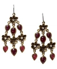 True glamour. Fossil's chandelier earrings feature dyed-purple jade and sparkling crystals that pop against a brass tone mixed metal setting. Approximate drop: 2-1/5 inches.