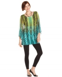 A vivid ombre effect in lively summer hues adorns this petite tunic from Style&co. The colors are complemented by a graphic print and sheer feminine sleeves. A vivid ombre effect in lively summer hues adorns this petite tunic from Style&co. The colors are complemented by a graphic print and sheer feminine sleeves.