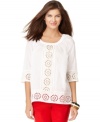 Jones New York Signature crafts this petite top with eyelet-style cutout details for a fresh spring spin. Try pairing with dark denim and wedges or skinny colored ankle pants and your favorite flats!