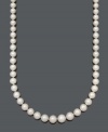 Celebrate traditional sophistication with a beautiful strand of pearls. Belle de Mer necklace features a graduated strand of A+ cultured freshwater pearls (8-12 mm) with a 14k gold clasp. Approximate length: 18 inches.
