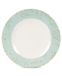 Sculpted blooms and a classic silhouette make the Toulouse dinner plates by Fitz and Floyd a charming part of any casual landscape. A rustic green glaze adds to its antique appeal.