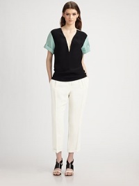 Equal parts sexy and casual, finished with cuffed, contrasting sleeves, contrast shoulder trim, and a plunging V front.Plunging V necklineContrast trim on shouldersContrasting cuffed cap sleeves68% acetate/32% silkDry cleanMade in ItalyModel shown is 5'9 (175cm) wearing US size 4. Equal parts sexy and casual, finished with cuffed, contrasting sleeves, contrast shoulder trim, and a plunging V front.Plunging V necklineContrast trim on shouldersContrasting cuffed cap sleeves68% acetate/32% silkDry cleanMade in ItalyModel shown is 5'9 (175cm) wearing US size 4.