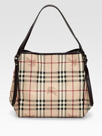 Traditional checks with a simple silhouette, expertly crafted in a durable PVC/cotton blend with extended leather shoulder straps.Shoulder straps, 7 drop Magnetic snap closure Inside removable zip pouch, 9½W X 6H X ¼D Cotton lining PVC/Cotton 10½W X 10H X 6D Made in Italy