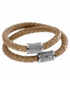 Double down on rich style. This Michael Kors bracelet is a natural beauty with double-wrapped braided leather. With silver tone mixed metal adorned with pave stones. Magnetic closure. Approximate length: 15-1/2 inches.