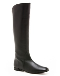 Slim and simply perfect, these Stuart Weitzman tall, flat boots are so chic. Slim and simply perfect, these Stuart Weitzman tall, flat boots are so chic.