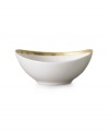 Give your tabletop a warm, golden glow with the Grand Buffet Gold elliptical bowl. The fine china body has a wide inner band of gold enhanced by a delicately detailed scroll pattern.