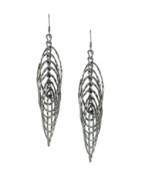 Create an optical illusion. Cut-out ovals stacked on top of one another form a layered pattern in BCBGeneration's dramatic drop earrings. Crafted in silver tone mixed metal. Approximate drop: 3 inches. Create an optical illusion. Cut-out ovals stacked on top of one another form a layered pattern in BCBGeneration's dramatic drop earrings. Crafted in silver tone mixed metal. Approximate drop: 3 inches.