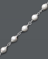 Exquisite elegance crafted in simple pearl and silver. A delicate strand of cultured freshwater pearls (9-10 mm) is complemented perfectly by its sterling silver setting. Approximate length: 8 inches. Exquisite elegance crafted in simple pearl and silver. A delicate strand of cultured freshwater pearls (9-10 mm) is complemented perfectly by its sterling silver setting. Approximate length: 8 inches.