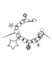 Shine on, rockstar! GUESS's star-studded charm bracelet features solid and cut-out stars, as well as crystal fireballs and spikes. Set in silver tone mixed metal with a lobster claw clasp. Approximate length: 7-1/2 inches. Shine on, rockstar! GUESS's star-studded charm bracelet features solid and cut-out stars, as well as crystal fireballs and spikes. Set in silver tone mixed metal with a lobster claw clasp. Approximate length: 7-1/2 inches.