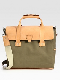 Inspired by the American hardware store aesthetic, this brief is constructed from the untanned leather reminiscent of tool belts and heavyweight, industrial canvas.Flap, zip closureDouble top handlesRemovable shoulder strapExterior patch pocketInterior zip pocketLeather/canvas13W x 15H x 4DImported