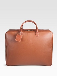 Travel in style, while your essentials are neatly packed away and organized in this elegant travel tote crafted from pebbled calfskin leather.Zip closureDouble top handlesExterior, interior pocketsLeather19W x 14H x 6DImported Travel in style, while your essentials are neatly packed away and organized in this elegant travel tote crafted from pebbled calfskin leather.Zip closureDouble top handlesExterior, interior pocketsLeather19W x 14H x 6DImported