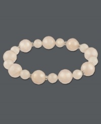Slip-on style for instant sophistication. Polished rose quartz beads (122-3/8 ct. t.w.) comprise this beautiful stretch style. Set in sterling silver. Approximate length: 7-1/2 inches.