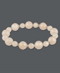 Slip-on style for instant sophistication. Polished rose quartz beads (122-3/8 ct. t.w.) comprise this beautiful stretch style. Set in sterling silver. Approximate length: 7-1/2 inches. Slip-on style for instant sophistication. Polished rose quartz beads (122-3/8 ct. t.w.) comprise this beautiful stretch style. Set in sterling silver. Approximate length: 7-1/2 inches.
