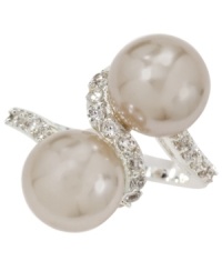 Wrap your fingers in the finest elegance. City by City's shimmering ring combines two glass pearls cradled in a seamless row of sparkling clear cubic zirconias (1/4 ct. t.w.). Set in silver tone mixed metal. Size 7. Wrap your fingers in the finest elegance. City by City's shimmering ring combines two glass pearls cradled in a seamless row of sparkling clear cubic zirconias (1/4 ct. t.w.). Set in silver tone mixed metal. Size 7.