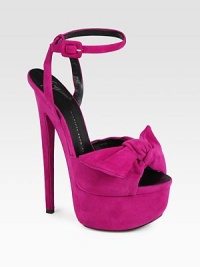 Divine suede silhouette with a sky-high heel, bow adornment and an adjustable ankle strap. Self-covered heel, 6 (150mm)Covered platform, 2 (50mm)Compares to a 4 heel (100mm)Suede upperLeather lining and solePadded insoleMade in ItalyOUR FIT MODEL RECOMMENDS ordering one half size up as this style runs small. Divine suede silhouette with a sky-high heel, bow adornment and an adjustable ankle strap. Self-covered heel, 6 (150mm)Covered platform, 2 (50mm)Compares to a 4 heel (100mm)Suede upperLeather lining and solePadded insoleMade in ItalyOUR FIT MODEL RECOMMENDS ordering one half size up as this style runs small.