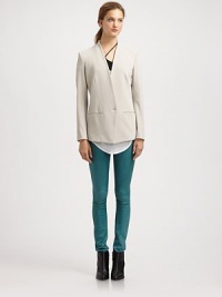 From the HELMUT capsule collection. Lightweight viscose ensures this knit jacket is super-soft, while classic tailoring forms an elegant silhouette. V-neckSingle button closureLong sleeves with buttoned cuffsFront besom pocketsBack ventAbout 29 from shoulder to hemViscose/spandexDry cleanMade in USA of Canadian fabricModel shown is 5'9 (176cm) wearing US size Small. From the HELMUT capsule collection. Lightweight viscose ensures this knit jacket is super-soft, while classic tailoring forms an elegant silhouette. V-neckSingle button closureLong sleeves with buttoned cuffsFront besom pocketsBack ventAbout 29 from shoulder to hemViscose/spandexDry cleanMade in USA of Canadian fabricModel shown is 5'9 (176cm) wearing US size Small.