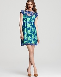 Boast a youthful look that's in high spirits with this Nanette Lepore lace and neon dress. Playful for summer, it's the look to flaunt when you're headed out to a special event. Boast a youthful look that's in high spirits with this Nanette Lepore lace and neon dress. Playful for summer, it's the look to flaunt when you're headed out to a special event.