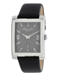 Classic design and cosmopolitan appeal blend perfectly on this watch by Kenneth Cole New York. Black leather strap and rectangular stainless steel case. Gray sunray dial features applied stick indices, numerals at three and nine o'clock, date window at six o'clock, three hands and logo. Quartz movement. Water resistant to 30 meters. Limited lifetime warranty. Classic design and cosmopolitan appeal blend perfectly on this watch by Kenneth Cole New York. Black leather strap and rectangular stainless steel case. Gray sunray dial features applied stick indices, numerals at three and nine o'clock, date window at six o'clock, three hands and logo. Quartz movement. Water resistant to 30 meters. Limited lifetime warranty.