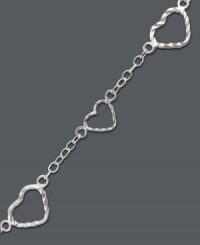 Open your hear to polished style. Giani Bernini's intricate filigree heart bracelet features a polished sterling silver chain and setting. Approximate length: 7-1/4 inches.