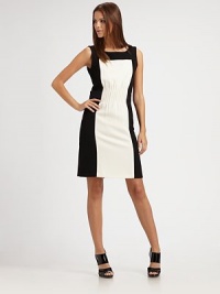 A shapely classic sheath with a modern difference, a contrast front panel that gives a framed effect.Wide rounded necklineSleevelessPintucking at the waistAttached satin beltBack slit hemBack zip closureAbout 37 from shoulder to hem97% polyester/3% spandexDry cleanMade in USA Model shown is 5'9½ (176cm) wearing US size 4. A shapely classic sheath with a modern difference, a contrast front panel that gives a framed effect.Wide rounded necklineSleevelessPintucking at the waistAttached satin beltBack slit hemBack zip closureAbout 37 from shoulder to hem97% polyester/3% spandexDry cleanMade in USA Model shown is 5'9½ (176cm) wearing US size 4.