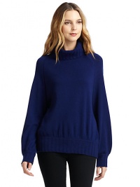 THE LOOKRibbed turtleneckPullover styleRaglan long sleevesRibbed cuffs and hemTHE FITAbout 28 from shoulder to hemTHE MATERIALCashmereCARE & ORIGINDry cleanImportedModel shown is 5'11 (180cm) wearing US size Small. THE LOOKRibbed turtleneckPullover styleRaglan long sleevesRibbed cuffs and hemTHE FITAbout 28 from shoulder to hemTHE MATERIALCashmereCARE & ORIGINDry cleanImportedModel shown is 5'11 (180cm) wearing US size Small.