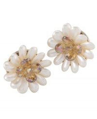 For the floral fanatic. Carolee's shimmery button earrings feature white and clear glass beads in pretty floral patterns. Crafted in gold tone mixed metal. Earrings have a clip on backing. Approximate diameter: 1-1/2 inches. For the floral fanatic. Carolee's shimmery button earrings feature white and clear glass beads in pretty floral patterns. Crafted in gold tone mixed metal. Earrings have a clip on backing. Approximate diameter: 1-1/2 inches.