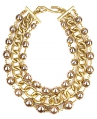 Give in to the drama. AK Anne Klein's dramatic necklace boasts warm hues with plastic pearl beads and heavy linked chains. Set in gold tone mixed metal with a hook closure. Approximate length: 16 inches + 2-inch extender. Give in to the drama. AK Anne Klein's dramatic necklace boasts warm hues with plastic pearl beads and heavy linked chains. Set in gold tone mixed metal with a hook closure. Approximate length: 16 inches + 2-inch extender.