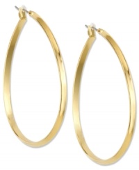 A must-have for your collection, Anne Klein's pear-shaped hoop earrings are gorgeous in gold tone mixed metal. Approximate diameter: 1-1/2 inches. A must-have for your collection, Anne Klein's pear-shaped hoop earrings are gorgeous in gold tone mixed metal. Approximate diameter: 1-1/2 inches.
