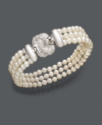 Complement your evening wear with this stunning accessory. Belle de Mer bracelet features three polished rows of cultured freshwater pearls (4-5 mm) and a sterling silver and diamond-accented clasp. Approximate length: 7-1/2 inches. Complement your evening wear with this stunning accessory. Belle de Mer bracelet features three polished rows of cultured freshwater pearls (4-5 mm) and a sterling silver and diamond-accented clasp. Approximate length: 7-1/2 inches.