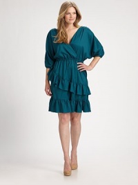 You will adore how its feminine neckline draws attention to your decolletage. Plus asymmetrical ruffles add chic appeal to this silk dress. V-necklineShort sleevesElasticized cuffs and waistAsymmetrical ruffle hemAbout 29 from natural waistSilkDry cleanMade in USA of imported fabric You will adore how its feminine neckline draws attention to your decolletage. Plus asymmetrical ruffles add chic appeal to this silk dress. V-necklineShort sleevesElasticized cuffs and waistAsymmetrical ruffle hemAbout 29 from natural waistSilkDry cleanMade in USA of imported fabric