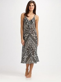 EXCLUSIVELY AT SAKS. Vivid and bold, a tribal-inspired print covers this sleeveless design with feminine ruffles. V-neckSleevelessRuffles at necklineFlared hemAbout 51 from shoulder to hemPolyesterMachine washImported EXCLUSIVELY AT SAKS. Vivid and bold, a tribal-inspired print covers this sleeveless design with feminine ruffles. V-neckSleevelessRuffles at necklineFlared hemAbout 51 from shoulder to hemPolyesterMachine washImported