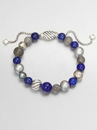 From the Spiritual Bead Collection. A beautiful beaded style with lapis labordarite and freshwater pearls on a sterling silver box chain. Lapis, labordarite and freshwater pearlsSterling silverDiameter, about 2 adjustableBeaded closureImported 